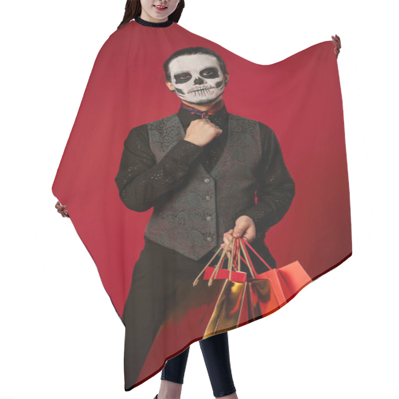 Personality  Man In Scary Sugar Skull Makeup And Festive Attire With Shopping Bags On Red, Seasonal Sale Hair Cutting Cape