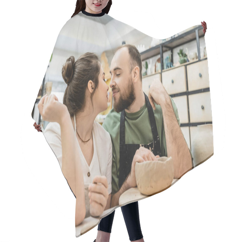 Personality  Smiling Couple Of Potters In Aprons Kissing While Sitting Near Clay In Ceramic Workshop Hair Cutting Cape