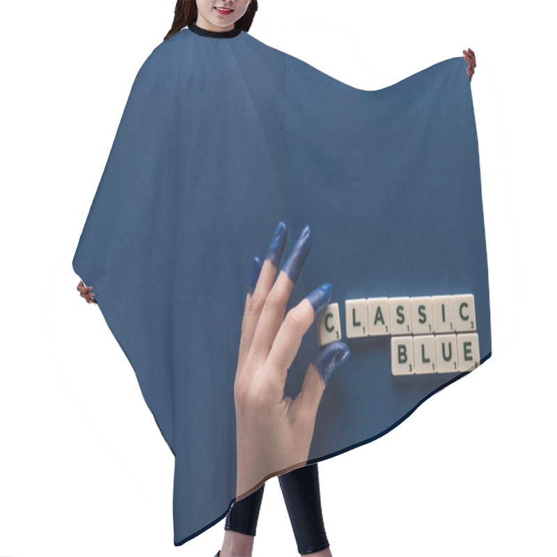 Personality  Cropped View Of Woman With Painted Fingers Near Classic Blue Lettering On Cubes On Blue Background Hair Cutting Cape