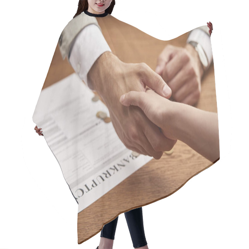 Personality  Partial View Of Man And Woman Shaking Hands Near Bankruptcy Form Hair Cutting Cape