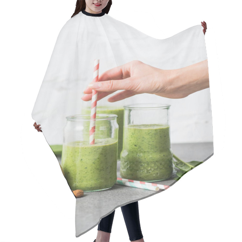 Personality  Female Hand Holding Straw In Glass With Green Smoothie Hair Cutting Cape