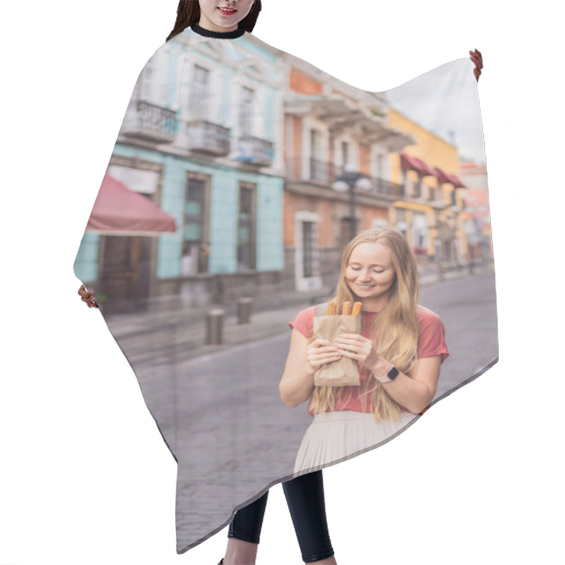 Personality  Female Tourist Eating Churros On A Colonial Street In Puebla, Mexico. Cultural Experience, Local Cuisine, And Street Food Exploration Concept. Hair Cutting Cape