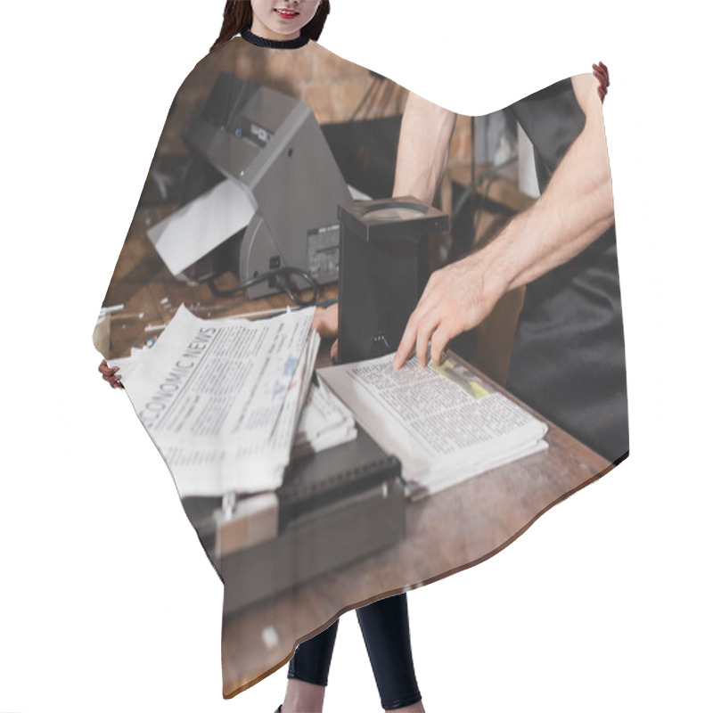 Personality  Partial View Of Man In Apron Checking Quality Of Newspaper Through Magnifying Glass In Print Center  Hair Cutting Cape