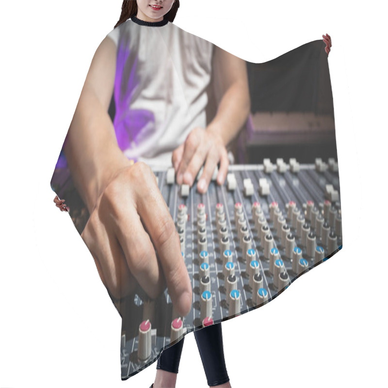 Personality  Sound Engineer Hand Adjusting Eq Knobs On Audio Mixing Console. Recording And Broadcasting Concept Hair Cutting Cape