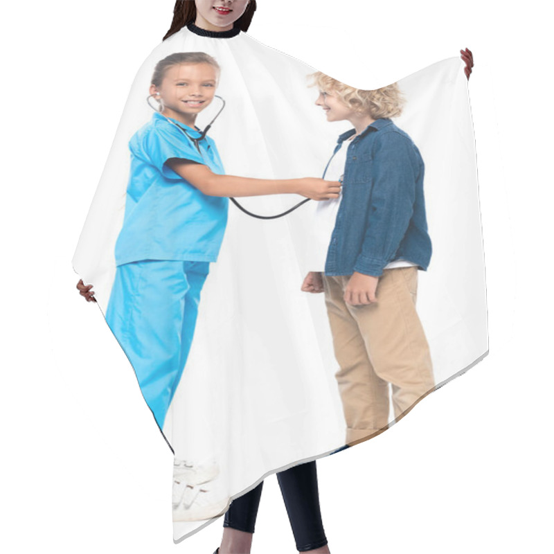 Personality  Child In Costume Of Doctor Examining Blonde And Curly Boy Isolated On White  Hair Cutting Cape