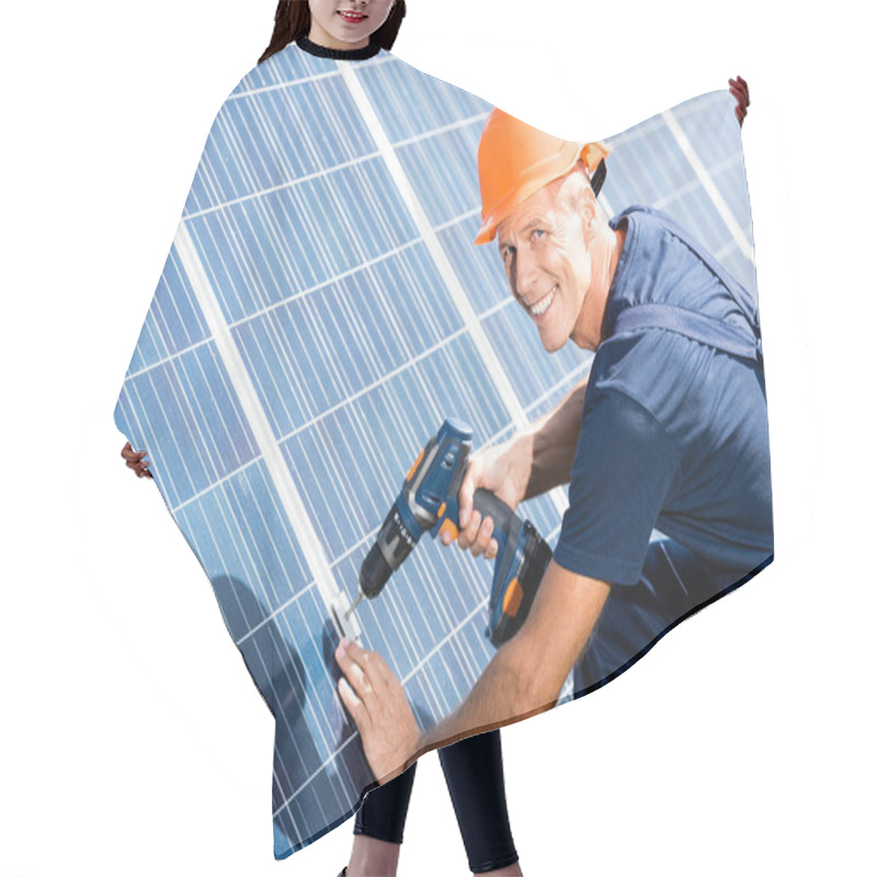 Personality  Handsome Engineer In T-shirt And Orange Hardhat Smiling And Using Drill  Hair Cutting Cape