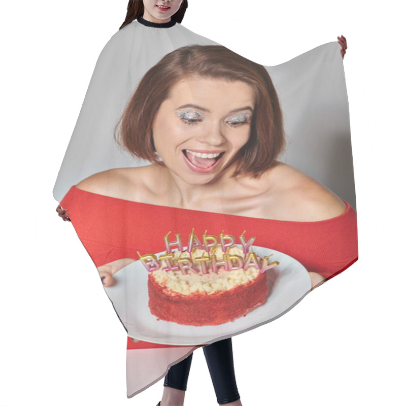 Personality  Thrilled Woman In Red Attire Looking At Bento Cake With Happy Birthday Candles On Grey Background Hair Cutting Cape