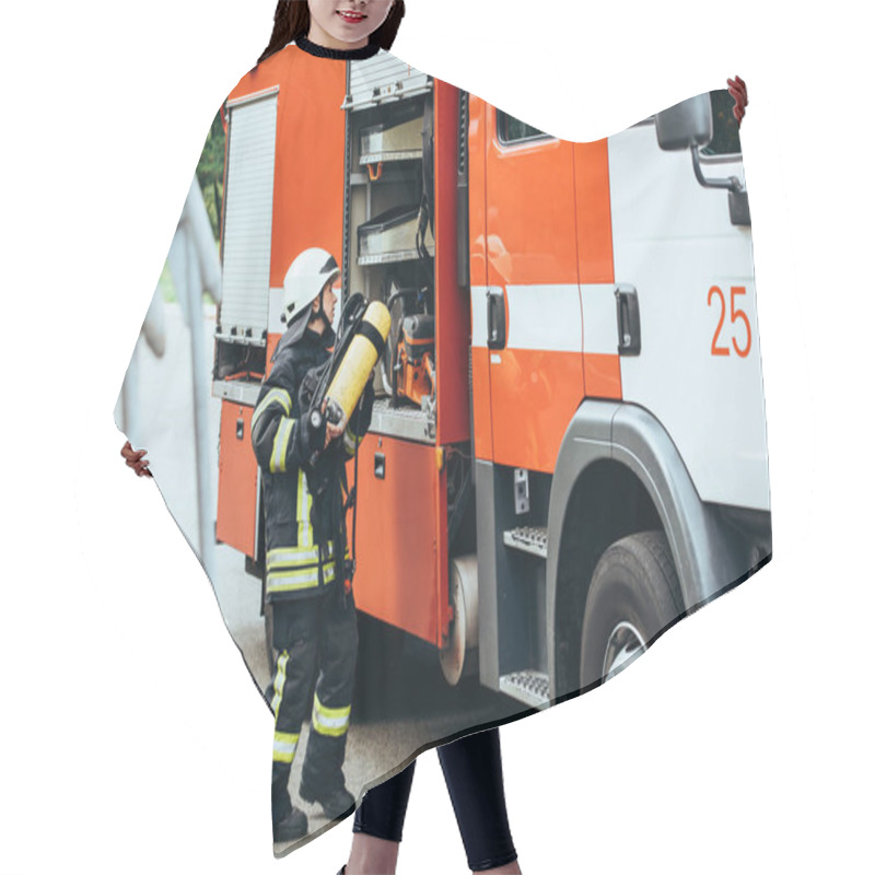 Personality  Female Firefighter In Protective Uniform Putting Fire Extinguisher Into Truck On Street Hair Cutting Cape