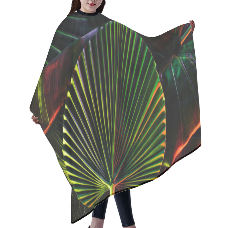 Personality  Toned Picture Of Various Tropical Leaves With Red Lighting  Hair Cutting Cape