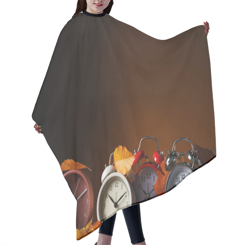 Personality  Alarm Clocks And Dry Leaves On Brown Background, Space For Text Hair Cutting Cape