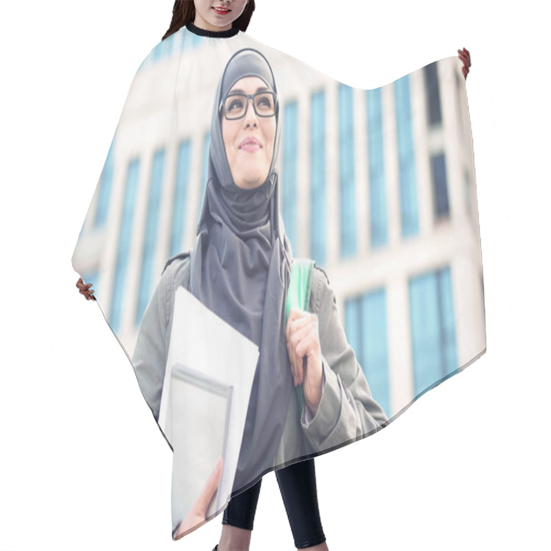 Personality  Inspired Young Female Student Wearing Hijab Smiling, Standing Outdoors On Campus Hair Cutting Cape