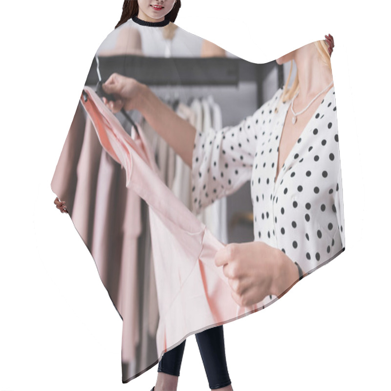 Personality  Cropped View Of Smiling Businesswoman Holding Dress On Hanger In Showroom Hair Cutting Cape