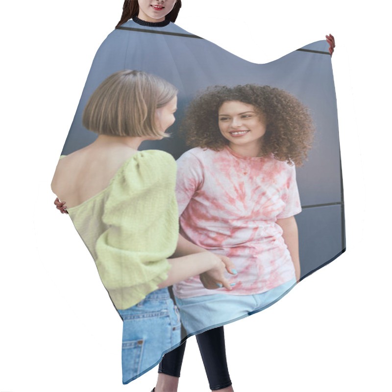 Personality  Two Young Women Enjoy Their Time Together, Laughing And Holding Hands In A Modern Backdrop. Hair Cutting Cape