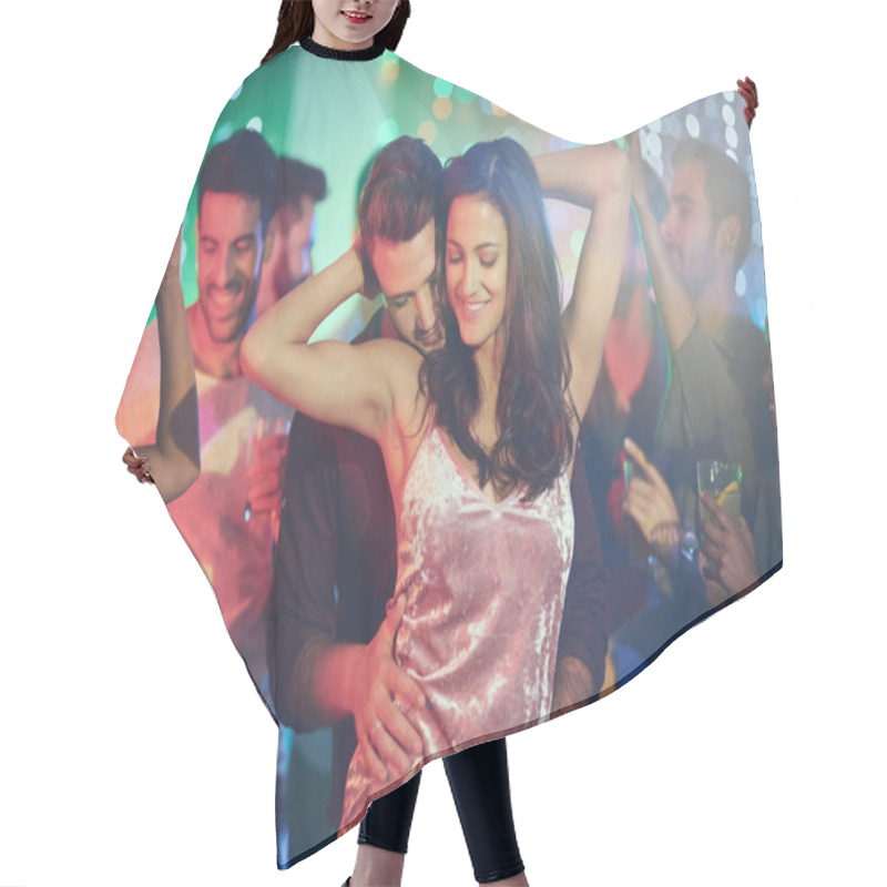 Personality  Like No One Else Is Around. Shot Of An Affectionate Young Couple Dancing On A Crowded Dance Floor In A Nightclub. Hair Cutting Cape