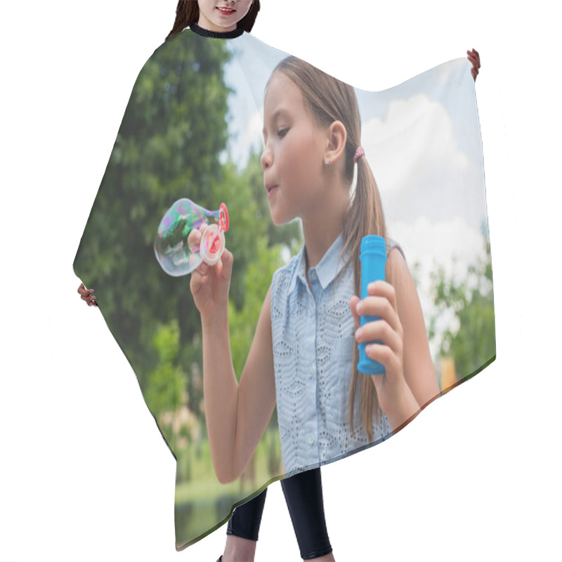 Personality  Girl In Sleeveless Blouse Blowing Soap Bubble In Park Hair Cutting Cape