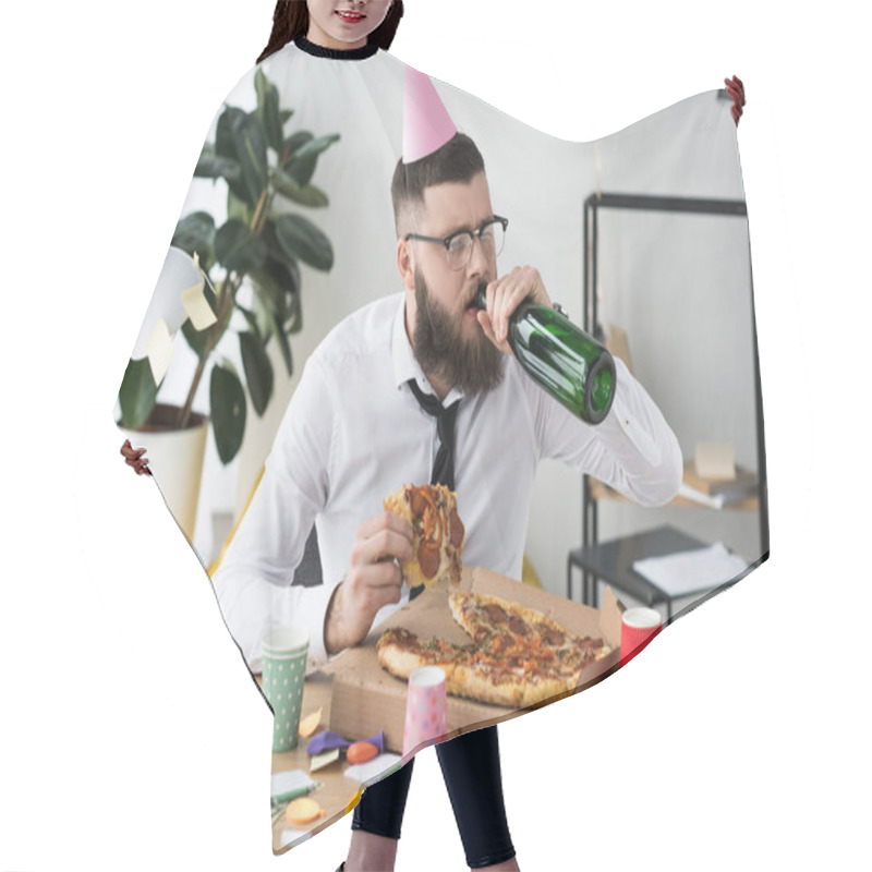 Personality  Businessman With Party Cone On Head Drinking Champagne While Eating Pizza At Workplace Hair Cutting Cape