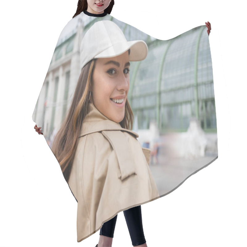 Personality  Happy Young Woman In Beige Trench Coat And Baseball Cap Hair Cutting Cape