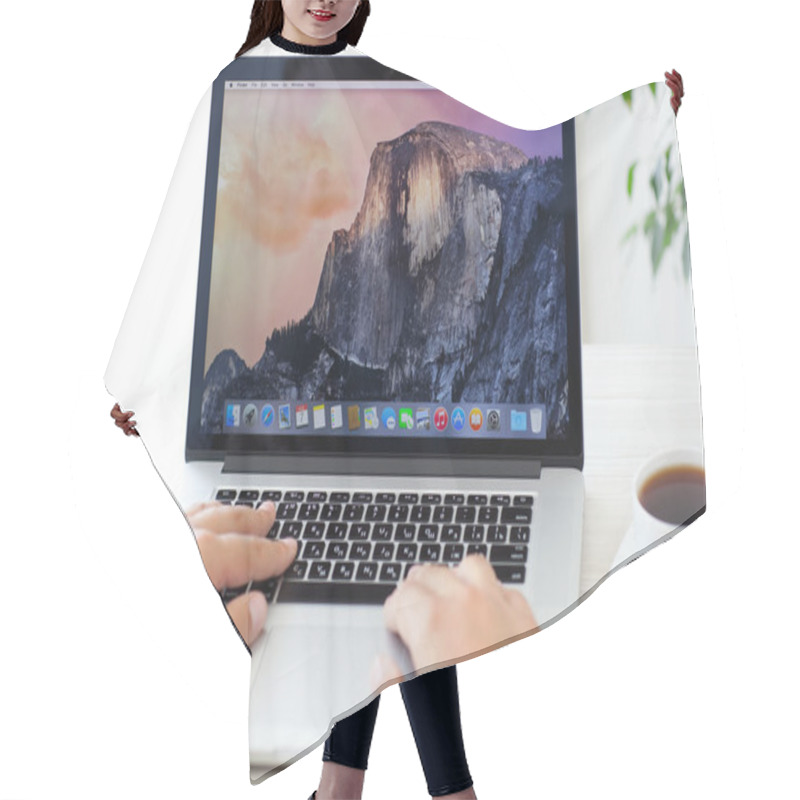 Personality  Man Sitting At The MacBook Pro Retina With OSX Yosemite On The S Hair Cutting Cape