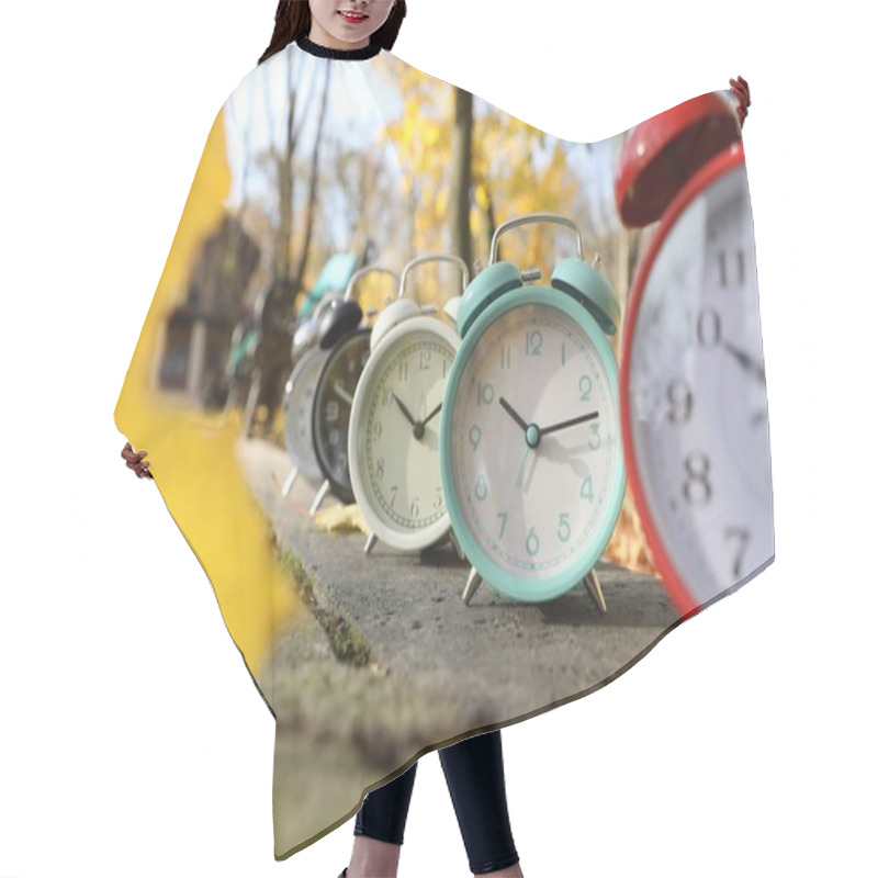 Personality  Alarm Clocks On Paved Pathway In Park At Autumn, Closeup Hair Cutting Cape