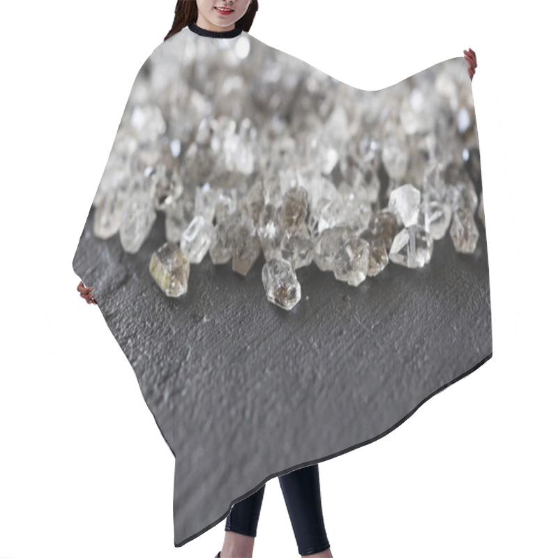 Personality  Scattered Diamonds On A Black Background. Raw Diamonds And Minin Hair Cutting Cape