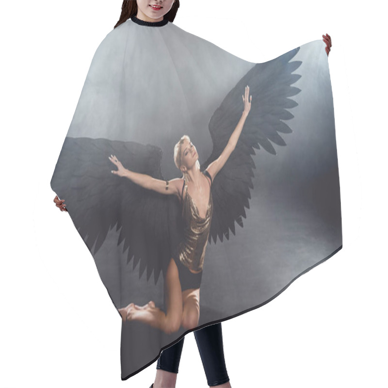 Personality  Beautiful Sexy Woman With Black Angel Wings And Outstretched Hands Sitting And Posing On Dark Background Hair Cutting Cape