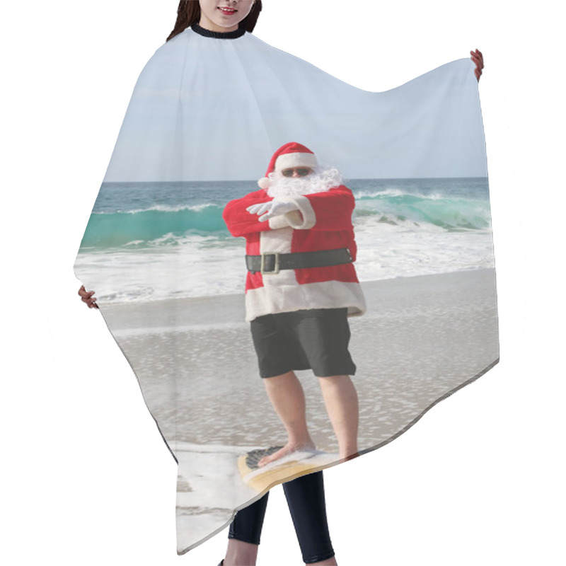 Personality  Surfing Santa. Santa Claus Is Riding A Surf Board. Santa Claus In Sunglasses Surfing In The Ocean. Santa Claus Surfs On His Surf Board While On A Beautiful Beach With A Blue Ocean. Christmas Vacation. Hair Cutting Cape