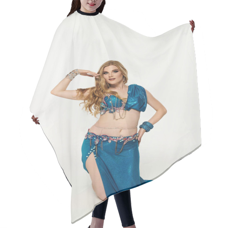 Personality  Young Woman In A Blue Dress Gracefully Posing For A Belly Dance. Hair Cutting Cape