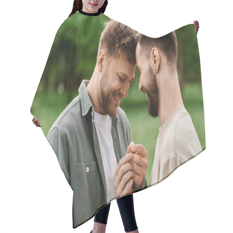 Personality  Two Bearded Gay Men Stand Close Together In A Green Park, Their Heads Touching As They Share A Tender Moment. Hair Cutting Cape