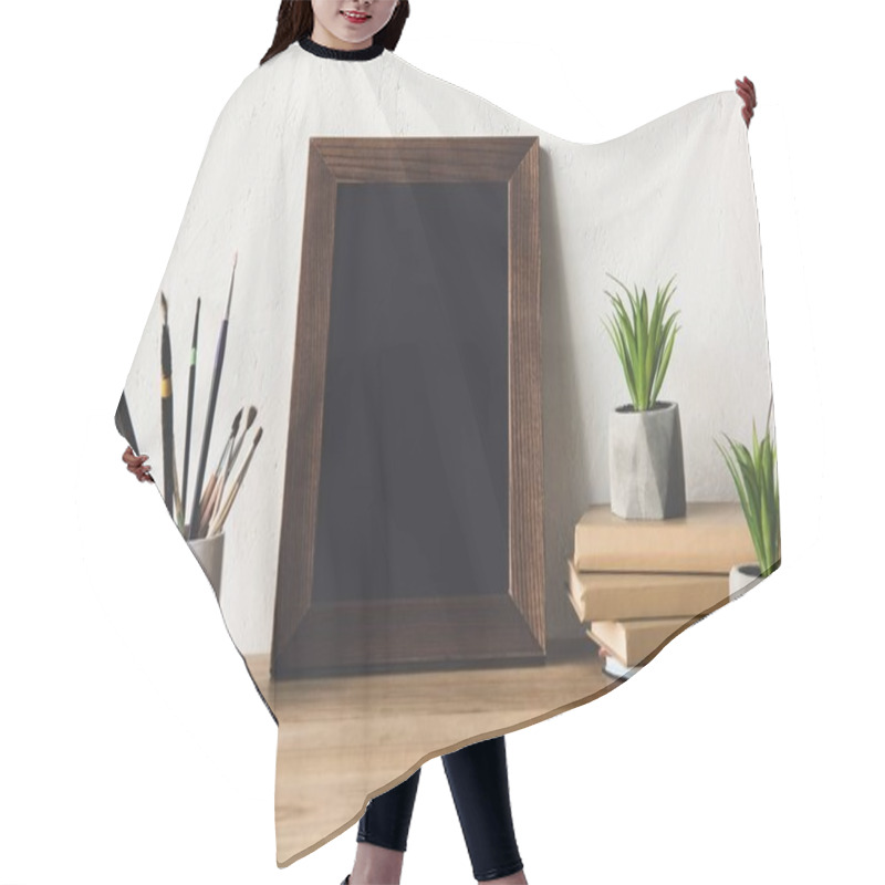 Personality  Photo Frame And Book On Tabletop Hair Cutting Cape