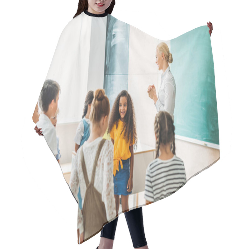 Personality  Happy Multiethnic Classmates Standing Around Teacher At Classroom Hair Cutting Cape