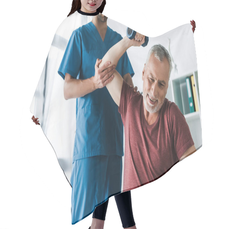 Personality  Cropped View Of Doctor Near Mature Man Working Out With Dumbbell  Hair Cutting Cape