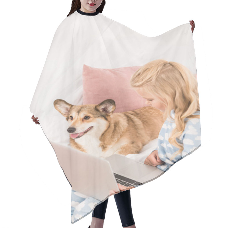 Personality  Child Sitting In Bed With Adorable Corgi Dog And Using Laptop At Home Hair Cutting Cape