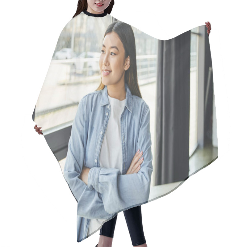 Personality  Pleased Asian Woman With Brunette Hair Standing With Folded Arms And Looking Away Near Window In Modern Office Space, Blue Denim Shirt, Happy Smile, Young And Successful Entrepreneur Hair Cutting Cape