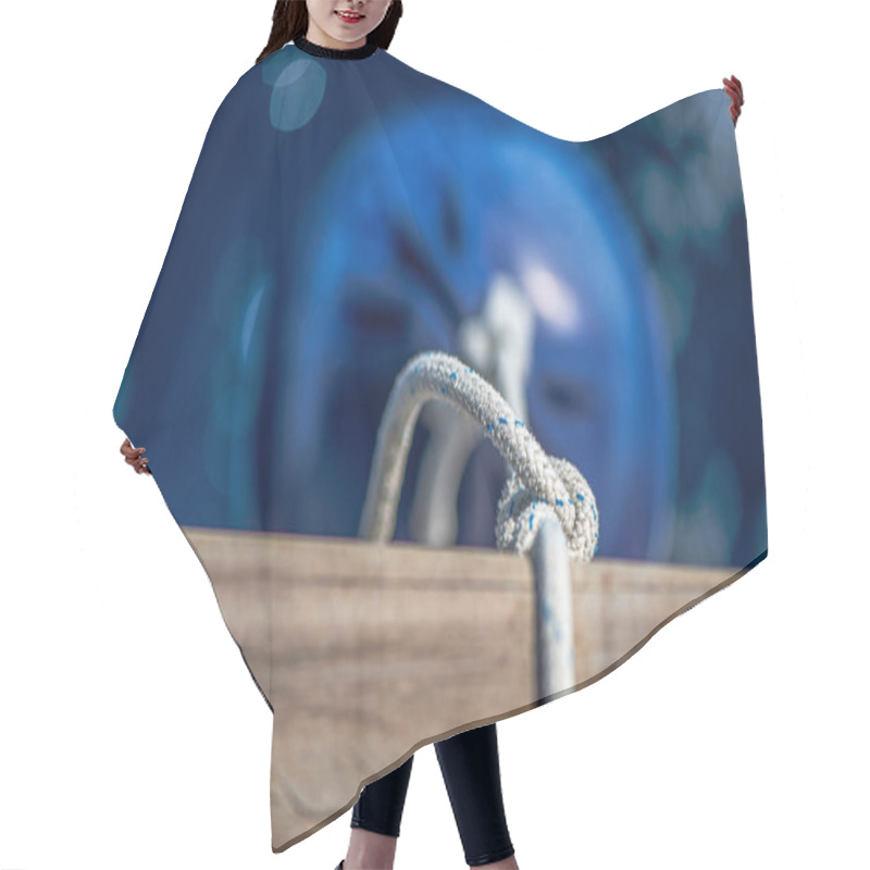 Personality  A Detailed View Of Essential Ship Components, Including A Sturdy Fender, Thick Ropes, And Various Nautical Elements Floating On The Sea, Capturing The Rugged Beauty Of Maritime Life. Hair Cutting Cape