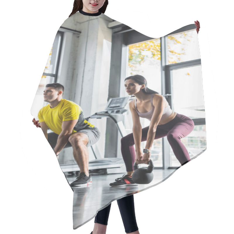 Personality  Sportsman And Sportswoman Doing Squat With Weights In Sports Center Hair Cutting Cape