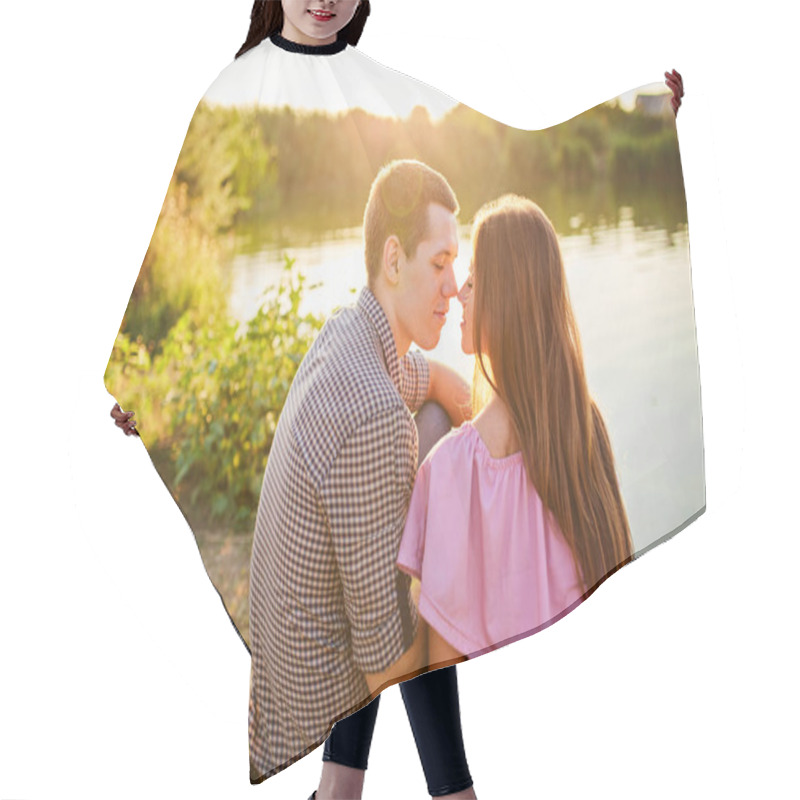 Personality  Beautiful Couple Embracing In Fields Of Reeds At Sunset. Lovers Being Affectionate In Beautiful Autumn Panorama. Young Couple Relaxing In Nature At Sunset In Golden Hour Hair Cutting Cape