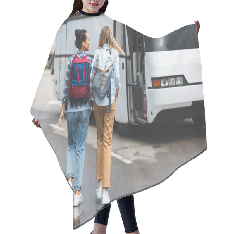 Personality  Rear View Of Women With Rucksacks Walking Near Travel Bus At Urban Street Hair Cutting Cape