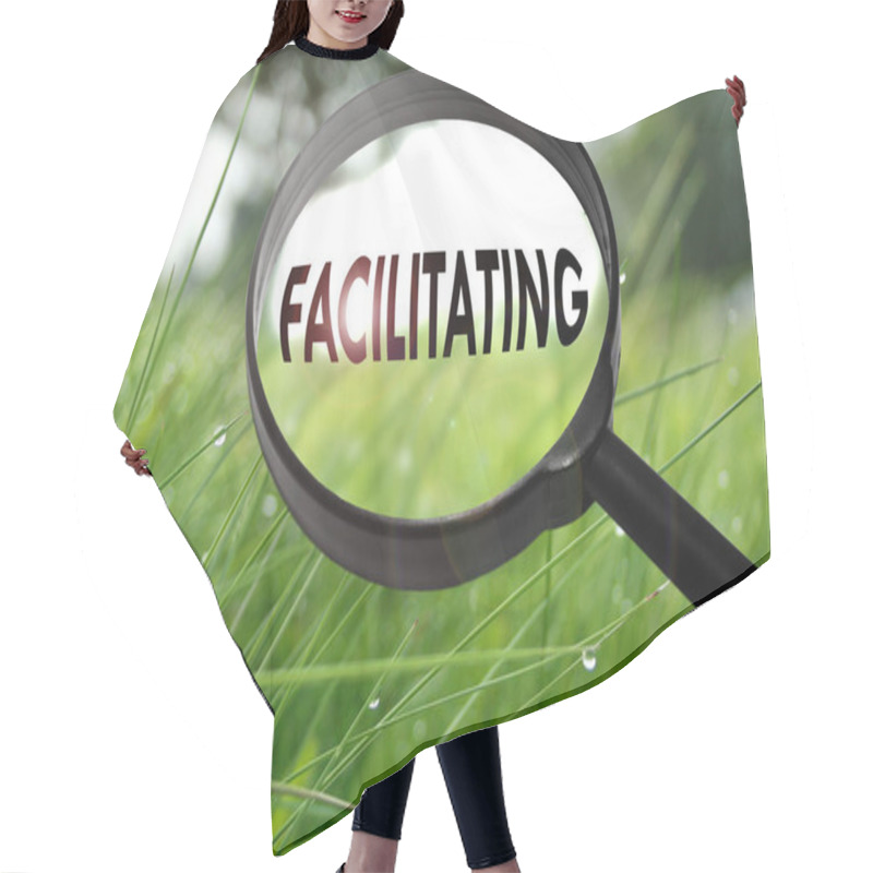 Personality  Magnifying Glass With The Word Facilitating On Grass Background. Selective Focus Hair Cutting Cape