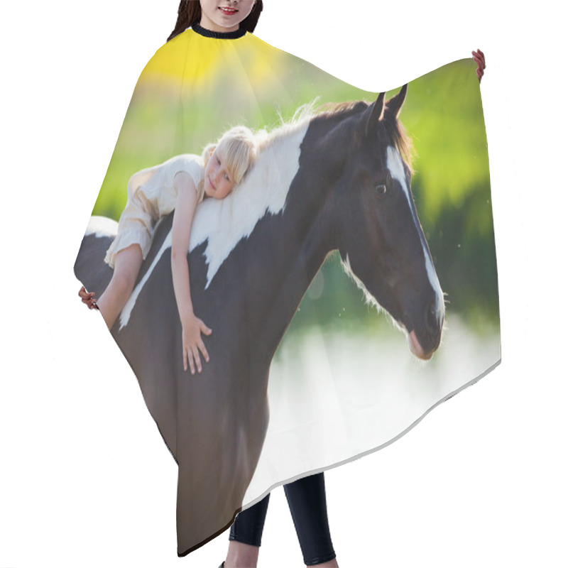 Personality  Child Sits On A Horse Hair Cutting Cape