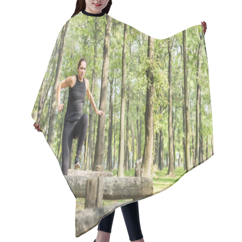 Personality  Female Athlete Jumping  On Fitness Trail Hair Cutting Cape