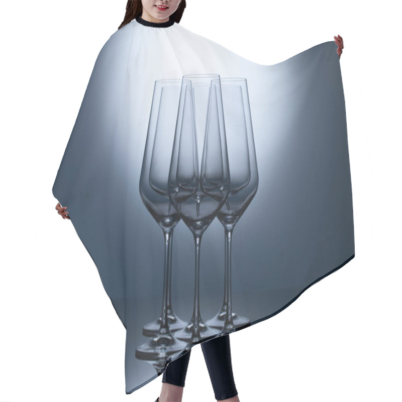 Personality  Empty Wine Glasses On A Blue Clean Gradient Background. Empty Drinking Transparent Wine Glasses Hair Cutting Cape