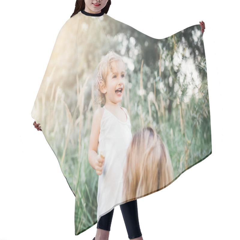 Personality  Smiling Adorable Daughter And Mother In Green Grass Hair Cutting Cape