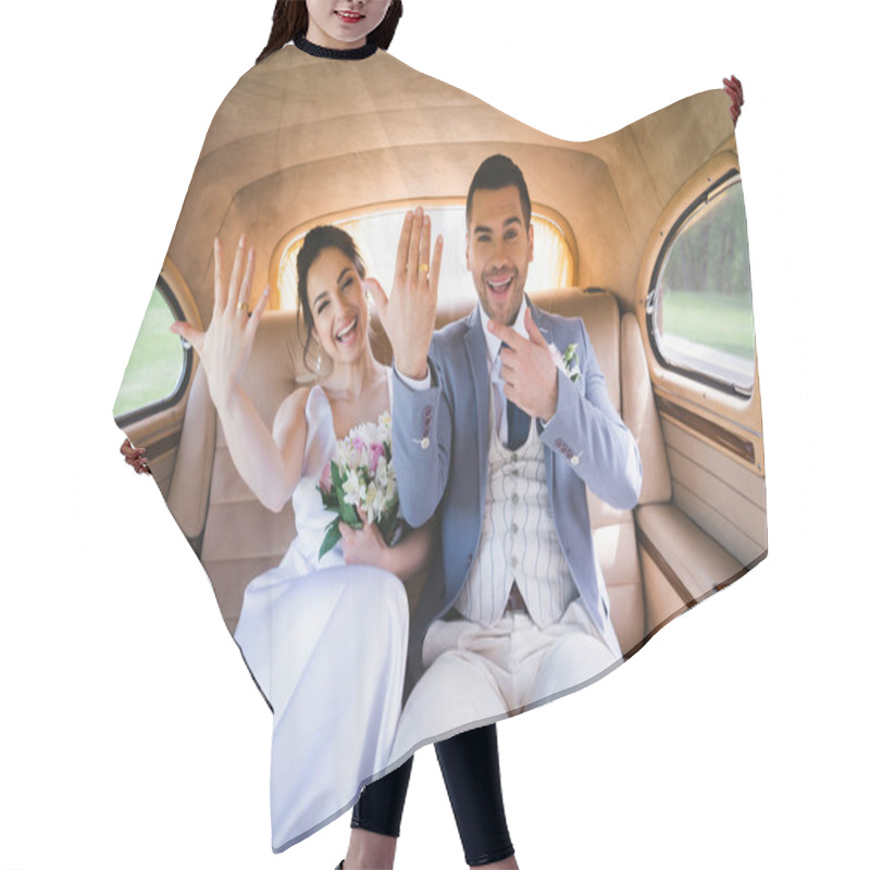 Personality  Cheerful Groom Pointing At Ring On Finger Near Bride In Retro Auto  Hair Cutting Cape