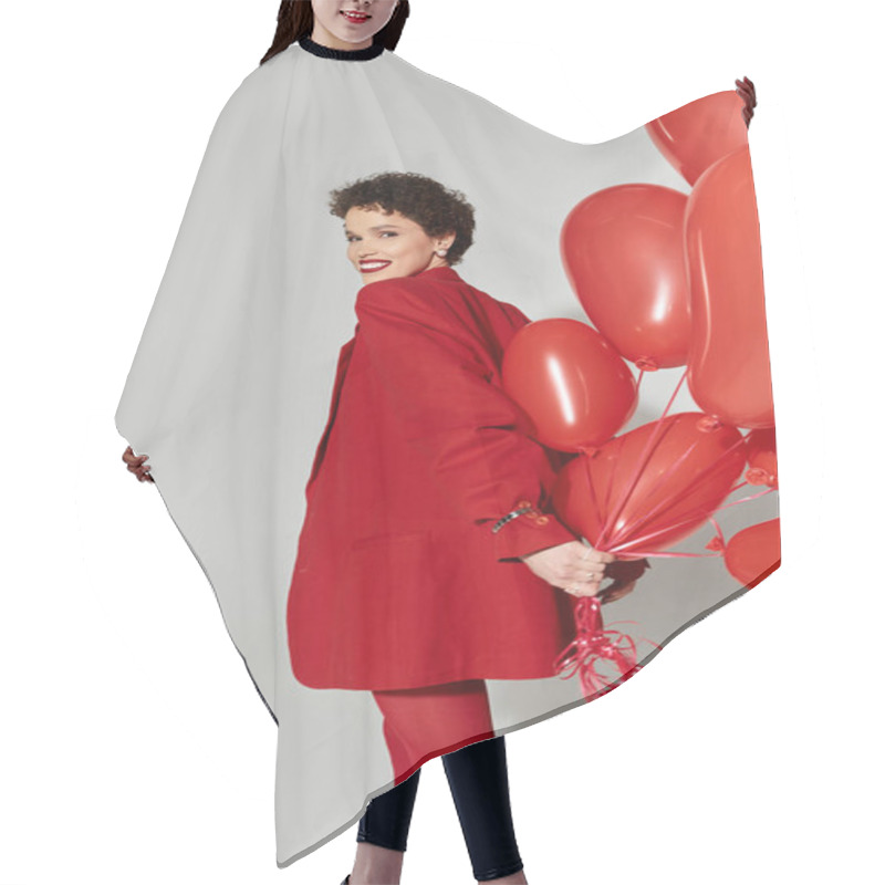 Personality  A Young Woman In A Striking Red Outfit Holds A Cluster Of Red Balloons, Exuding Happiness. Hair Cutting Cape