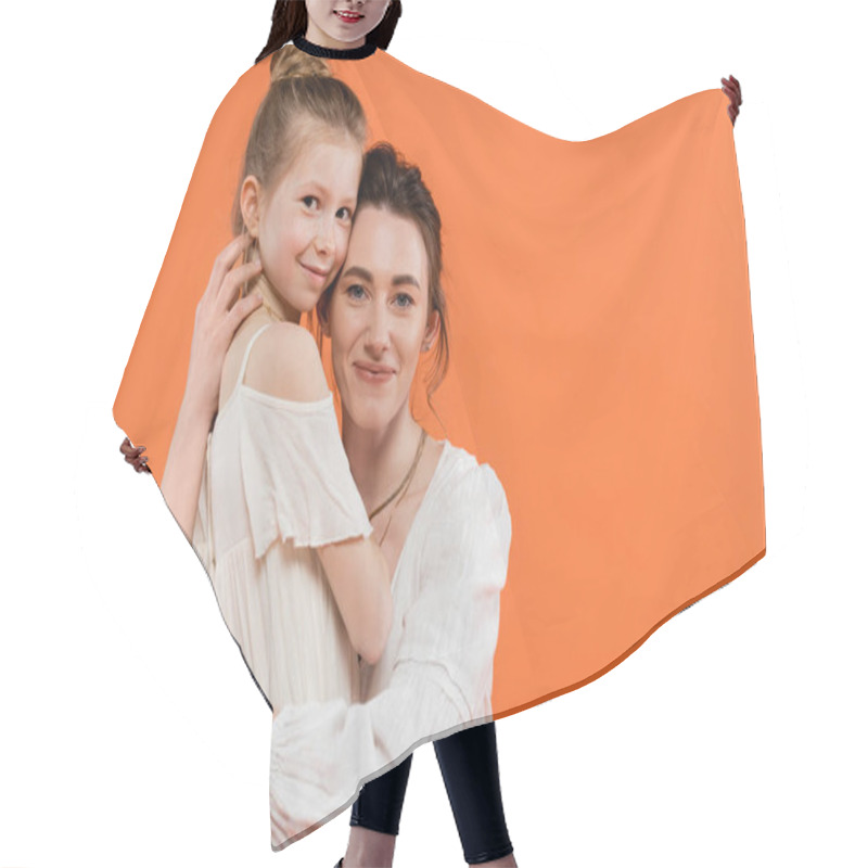 Personality  Family Bonding, Joyful Mother And Daughter Hugging Each Other On Orange Background Smile, White Sun Dresses, Modern Parenting, Summer Fashion, Togetherness, Mom And Her Child  Hair Cutting Cape