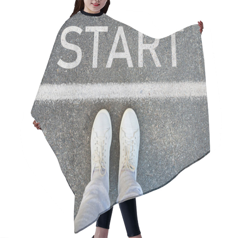 Personality  Female Legs In White Sneakers Standing On The Asphalt With The Word 