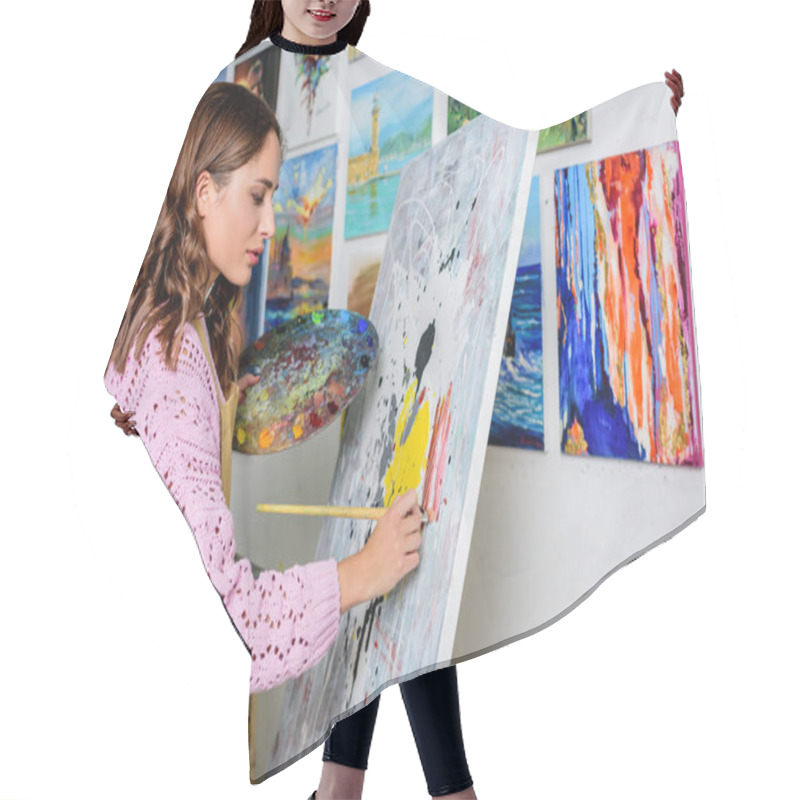 Personality  Side View Of Beautiful Female Artist Painting In Workshop Hair Cutting Cape