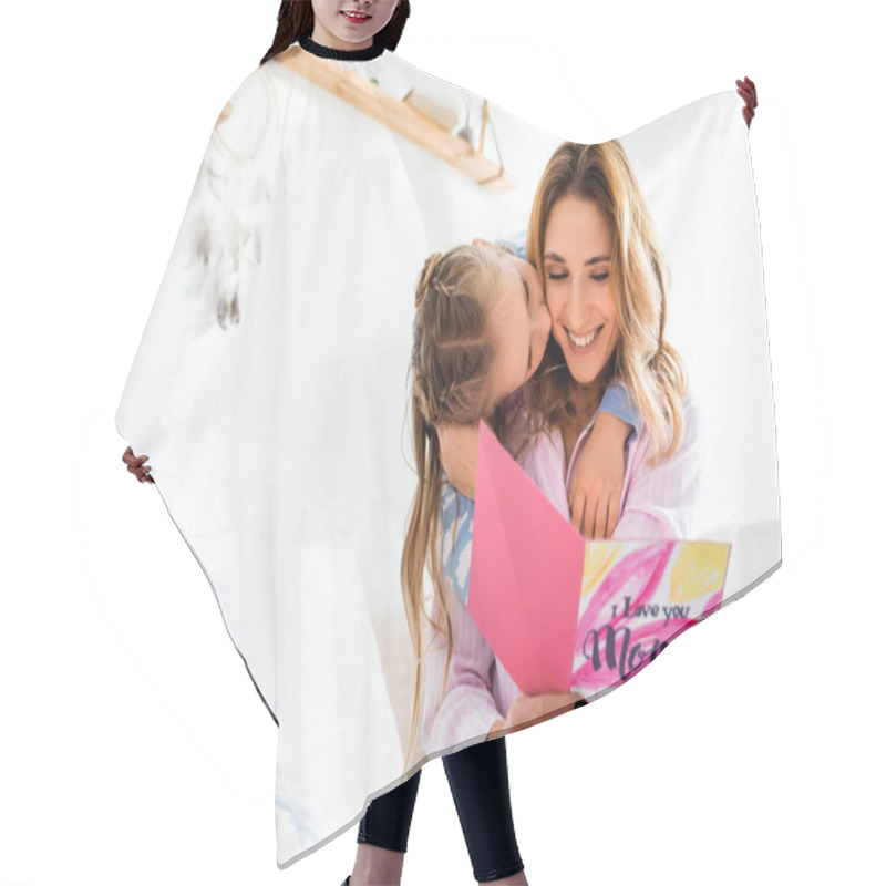 Personality  Daughter Kissing Smiling Mother With Card In Mothers Day Hair Cutting Cape