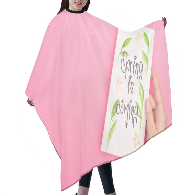 Personality  Cropped View Of Woman Holding Card With Spring Is Coming Lettering On Pink Background Hair Cutting Cape