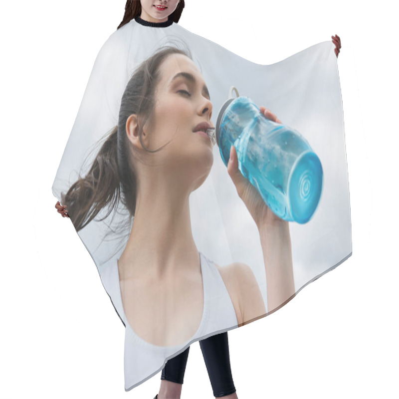 Personality  Low Angle View Of Young Woman In Crop Top Drinking Water Against Blue Sky With Clouds Hair Cutting Cape